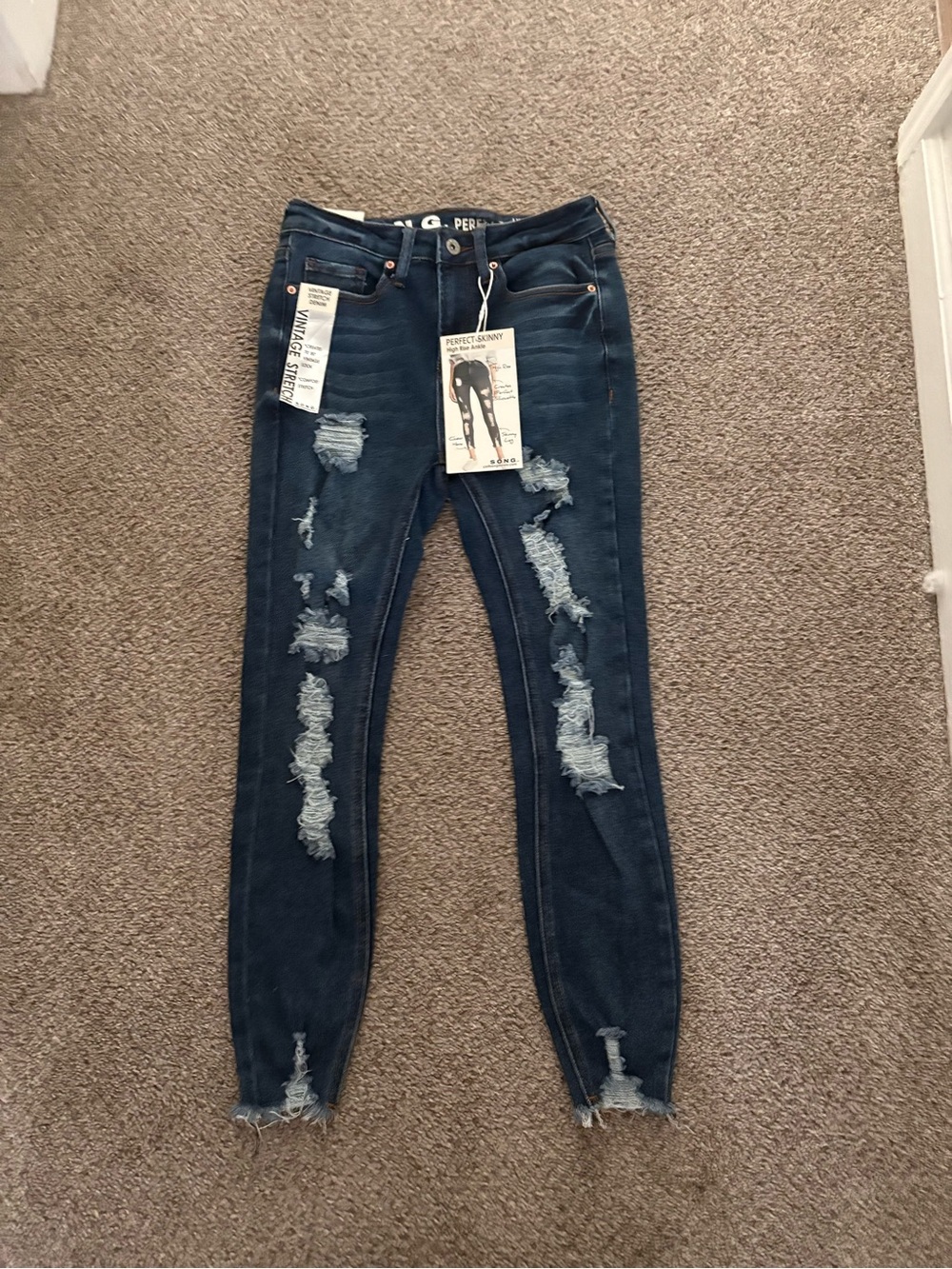 Perfect Skinny Distressed Jeans in Dark Blue - Women’s Skinny